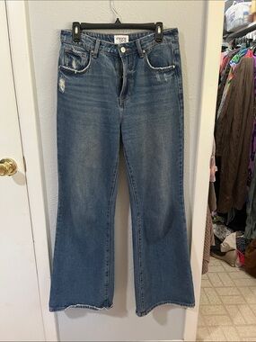 Indigo Flare Jeans with Subtle Distress by Insane Glory
